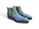 Lug Sole Chelsea Boot with Wingtip Toe in Olive