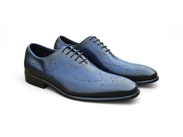 Carrucci Shoes Whole Cut Oxford Medallion Dress Shoe in Navy