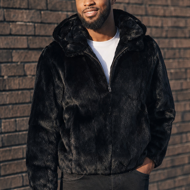 Calvere Furs Men's Full Skin Rabbit Jacket with Detachable Hood in Black, worn