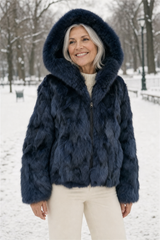 Calvere Furs Women's Fox Bomber Jacket with Hood in Navy, worn